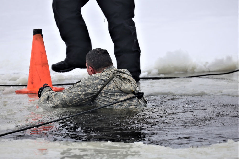 Cold-Weather Operations Course students participate in cold-water immersion training