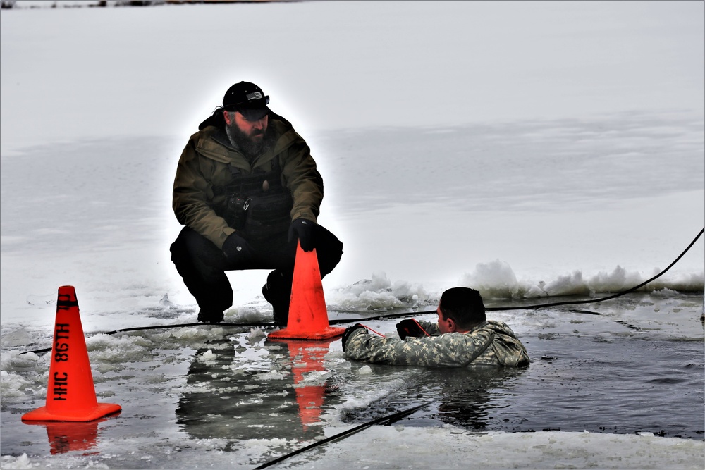 Cold-Weather Operations Course students participate in cold-water immersion training