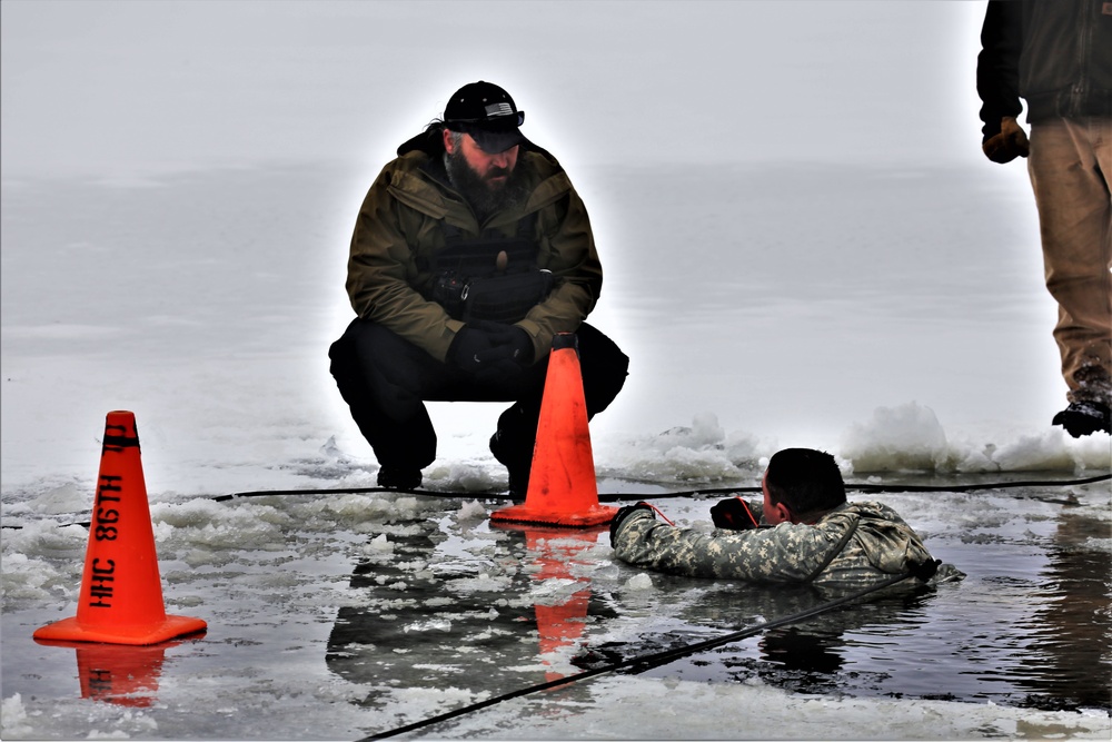 Cold-Weather Operations Course students participate in cold-water immersion training