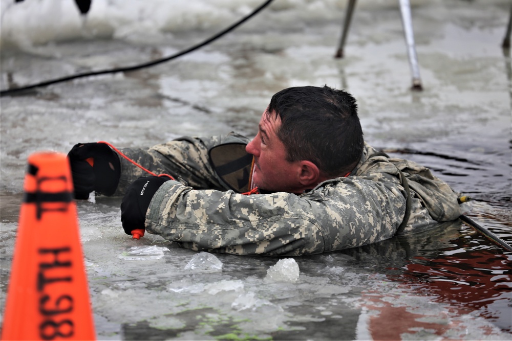 Cold-Weather Operations Course students participate in cold-water immersion training