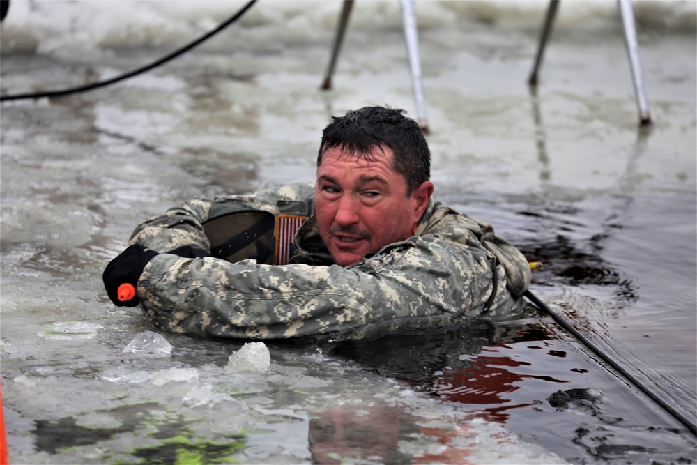 Cold-Weather Operations Course students participate in cold-water immersion training