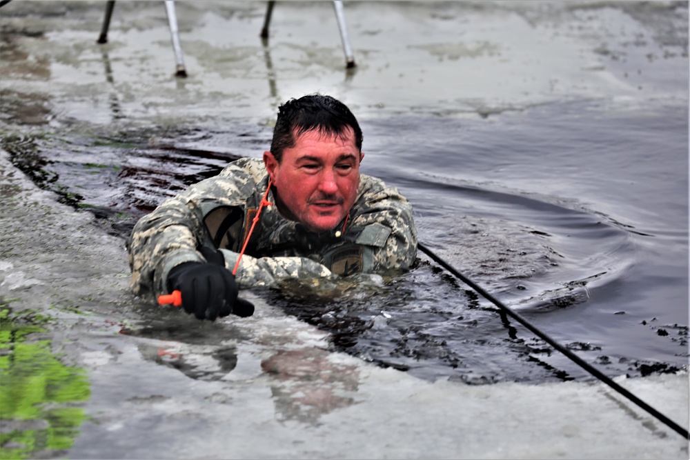 Cold-Weather Operations Course students participate in cold-water immersion training