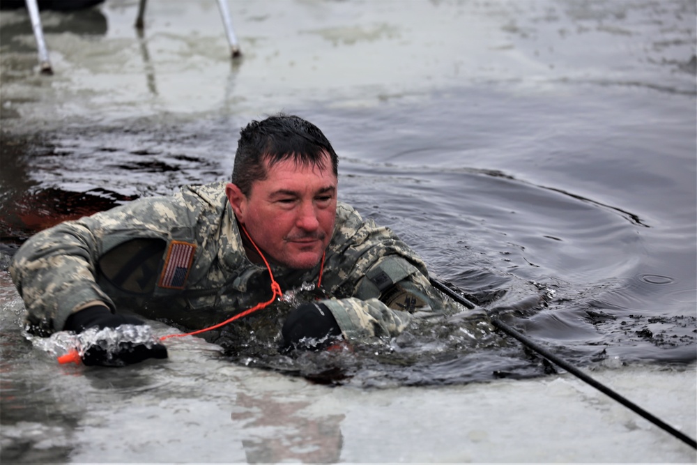 Cold-Weather Operations Course students participate in cold-water immersion training