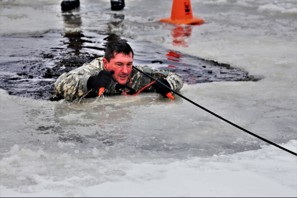 Cold-Weather Operations Course students participate in cold-water immersion training