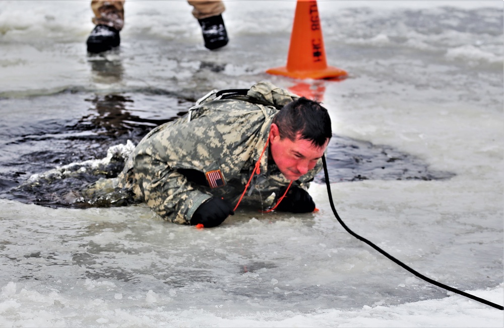 Cold-Weather Operations Course students participate in cold-water immersion training