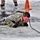 Cold-Weather Operations Course students participate in cold-water immersion training
