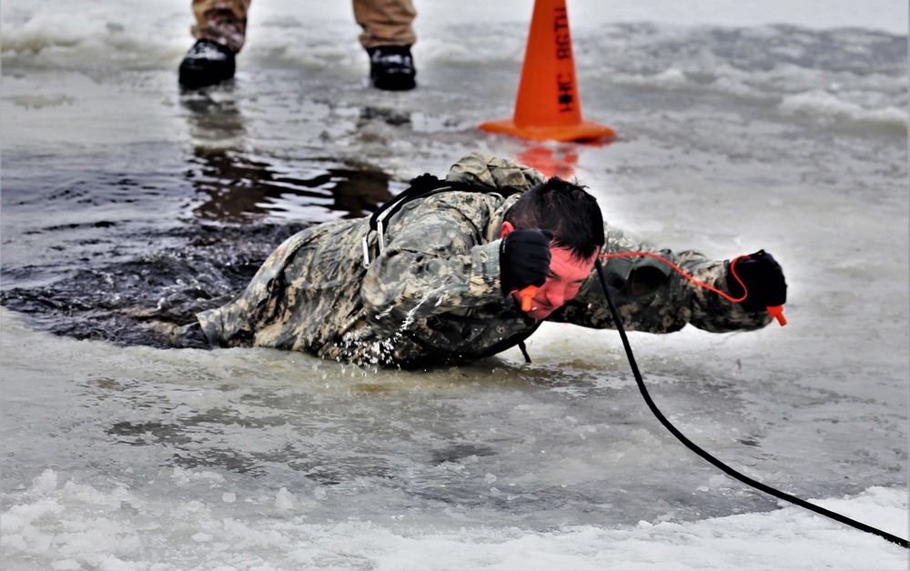 Cold-Weather Operations Course students participate in cold-water immersion training