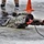 Cold-Weather Operations Course students participate in cold-water immersion training