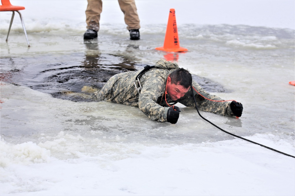 Cold-Weather Operations Course students participate in cold-water immersion training