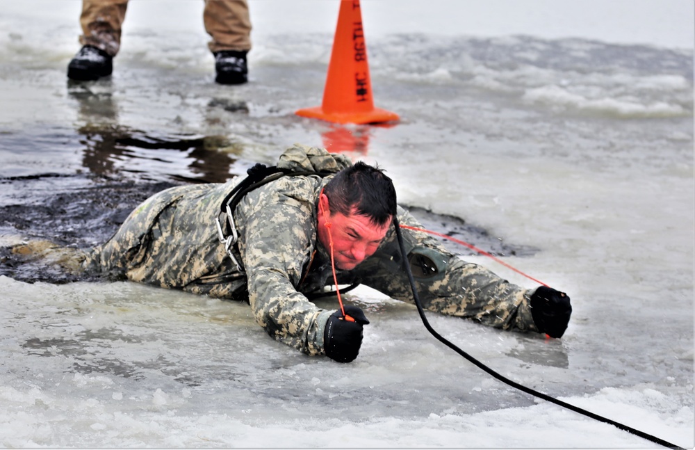 Cold-Weather Operations Course students participate in cold-water immersion training