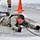 Cold-Weather Operations Course students participate in cold-water immersion training