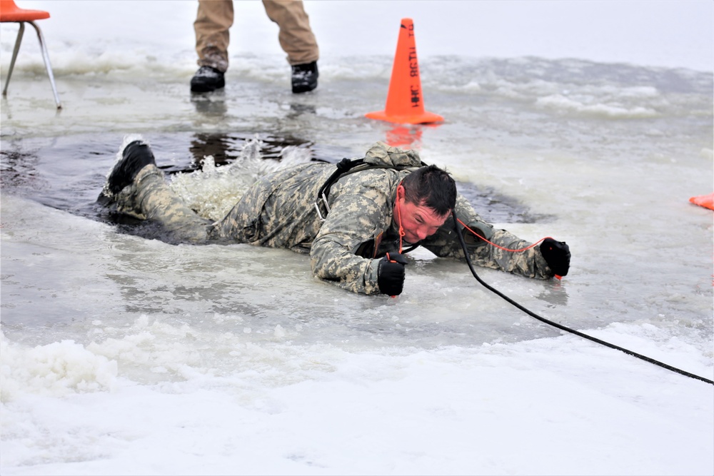 Cold-Weather Operations Course students participate in cold-water immersion training