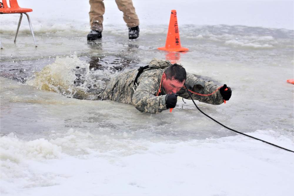 Cold-Weather Operations Course students participate in cold-water immersion training