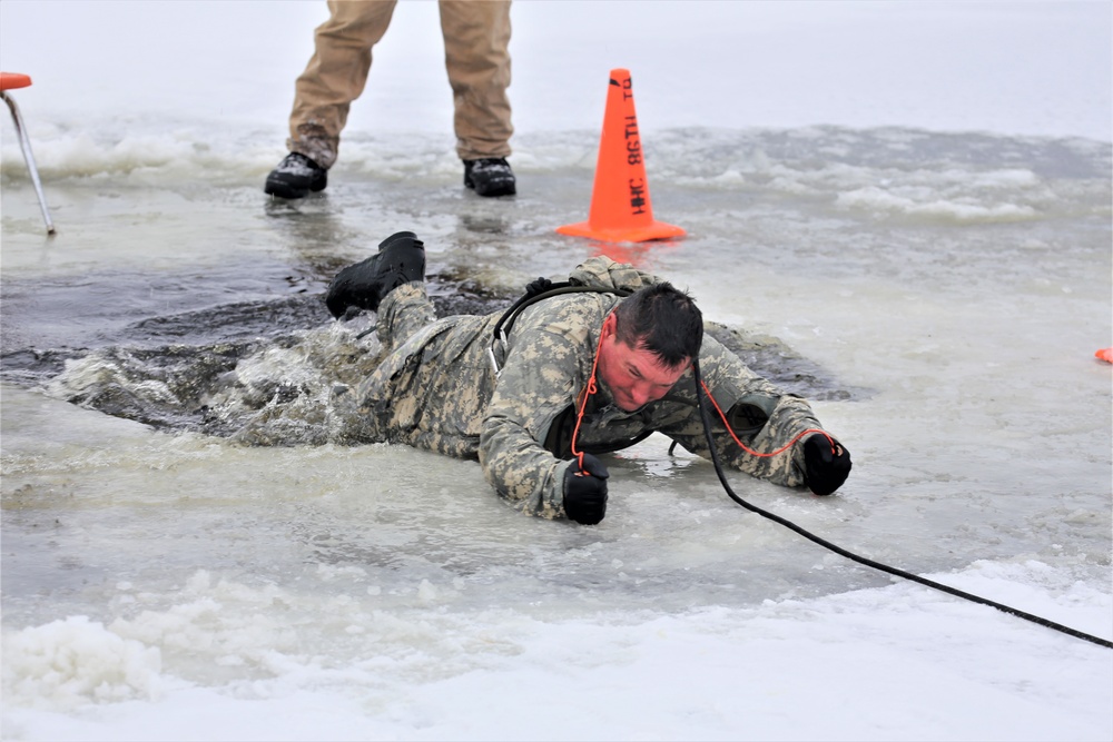 Cold-Weather Operations Course students participate in cold-water immersion training