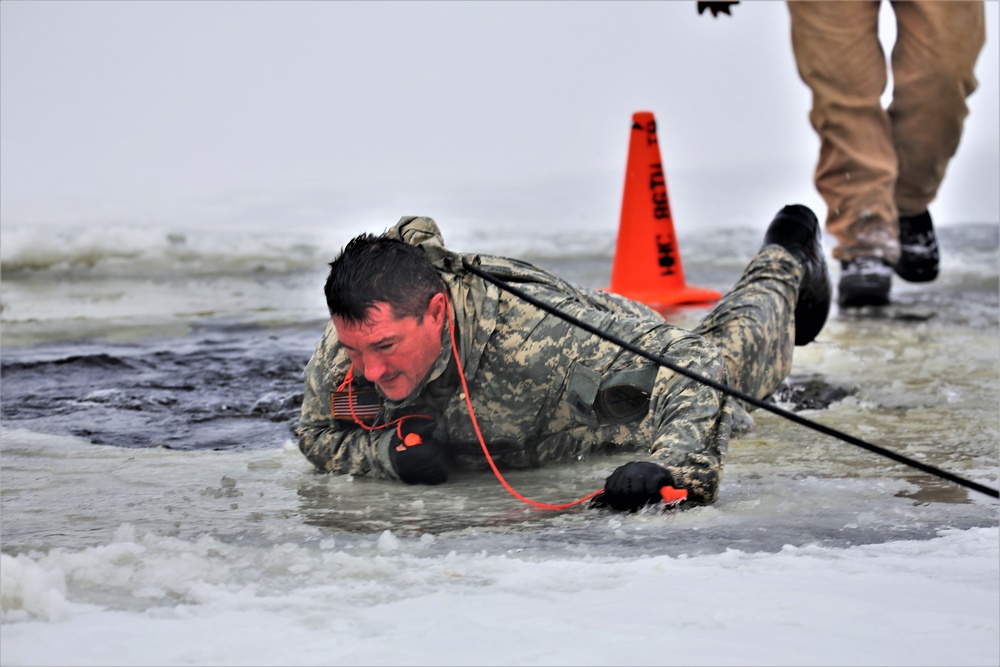 Cold-Weather Operations Course students participate in cold-water immersion training