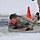 Cold-Weather Operations Course students participate in cold-water immersion training