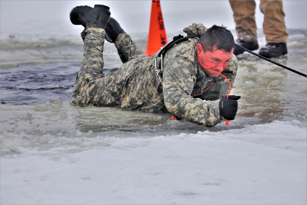 Cold-Weather Operations Course students participate in cold-water immersion training