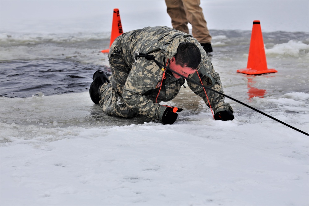 Cold-Weather Operations Course students participate in cold-water immersion training