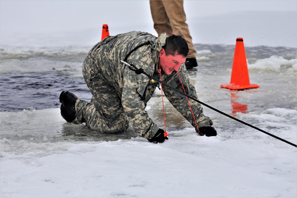 Cold-Weather Operations Course students participate in cold-water immersion training