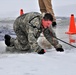 Cold-Weather Operations Course students participate in cold-water immersion training