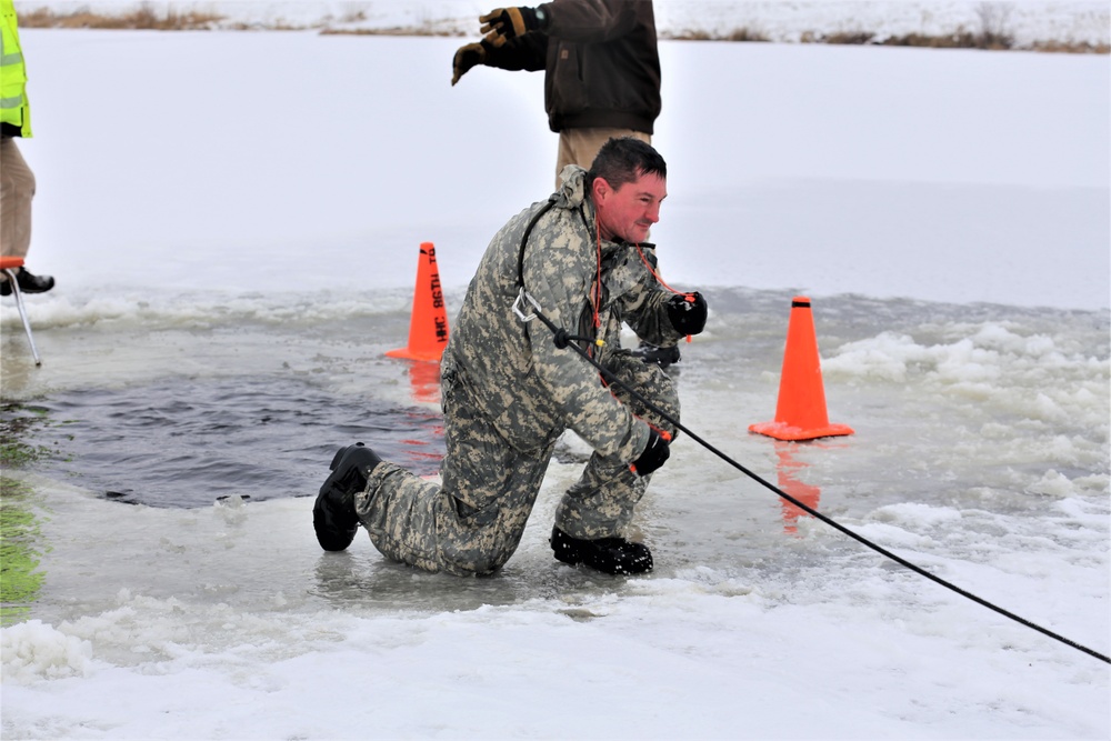 Cold-Weather Operations Course students participate in cold-water immersion training