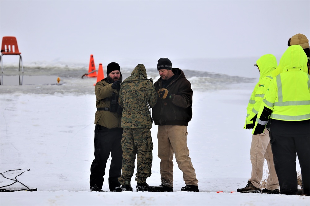 Cold-Weather Operations Course students participate in cold-water immersion training