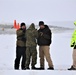 Cold-Weather Operations Course students participate in cold-water immersion training