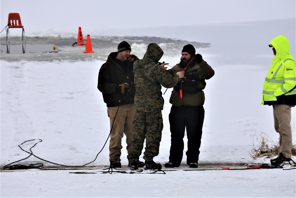 Cold-Weather Operations Course students participate in cold-water immersion training