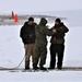 Cold-Weather Operations Course students participate in cold-water immersion training