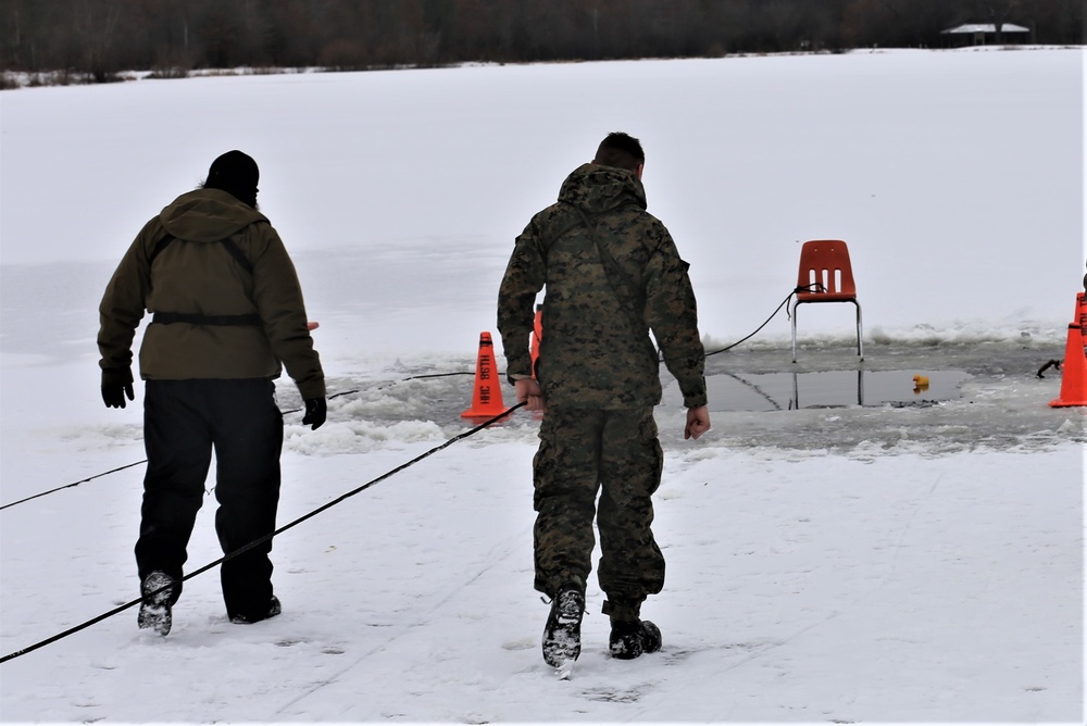 Cold-Weather Operations Course students participate in cold-water immersion training