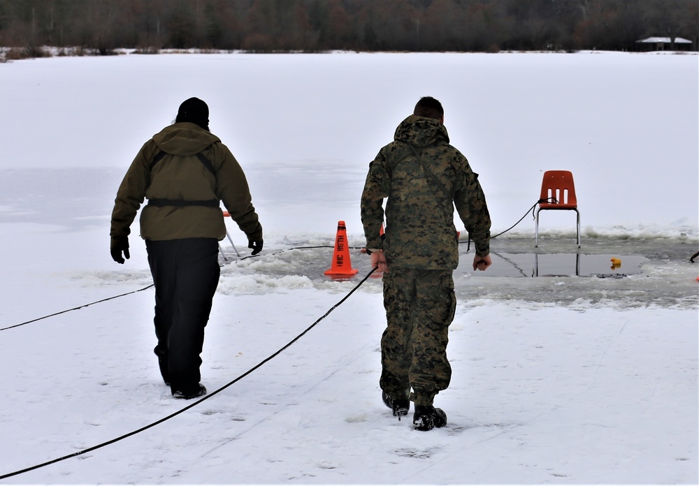 Cold-Weather Operations Course students participate in cold-water immersion training