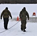 Cold-Weather Operations Course students participate in cold-water immersion training