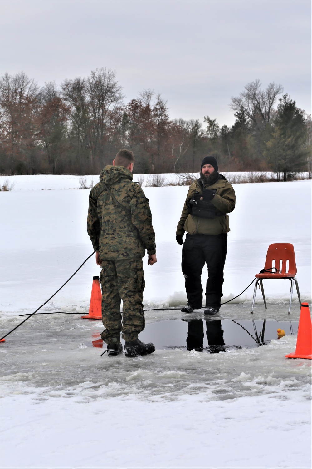 Cold-Weather Operations Course students participate in cold-water immersion training