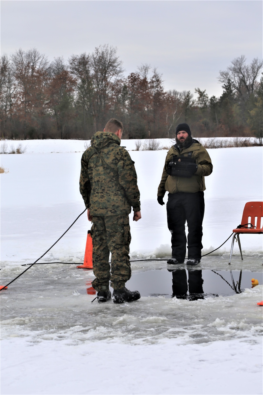 Cold-Weather Operations Course students participate in cold-water immersion training