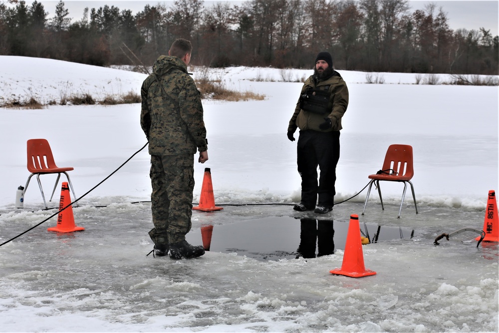 Cold-Weather Operations Course students participate in cold-water immersion training