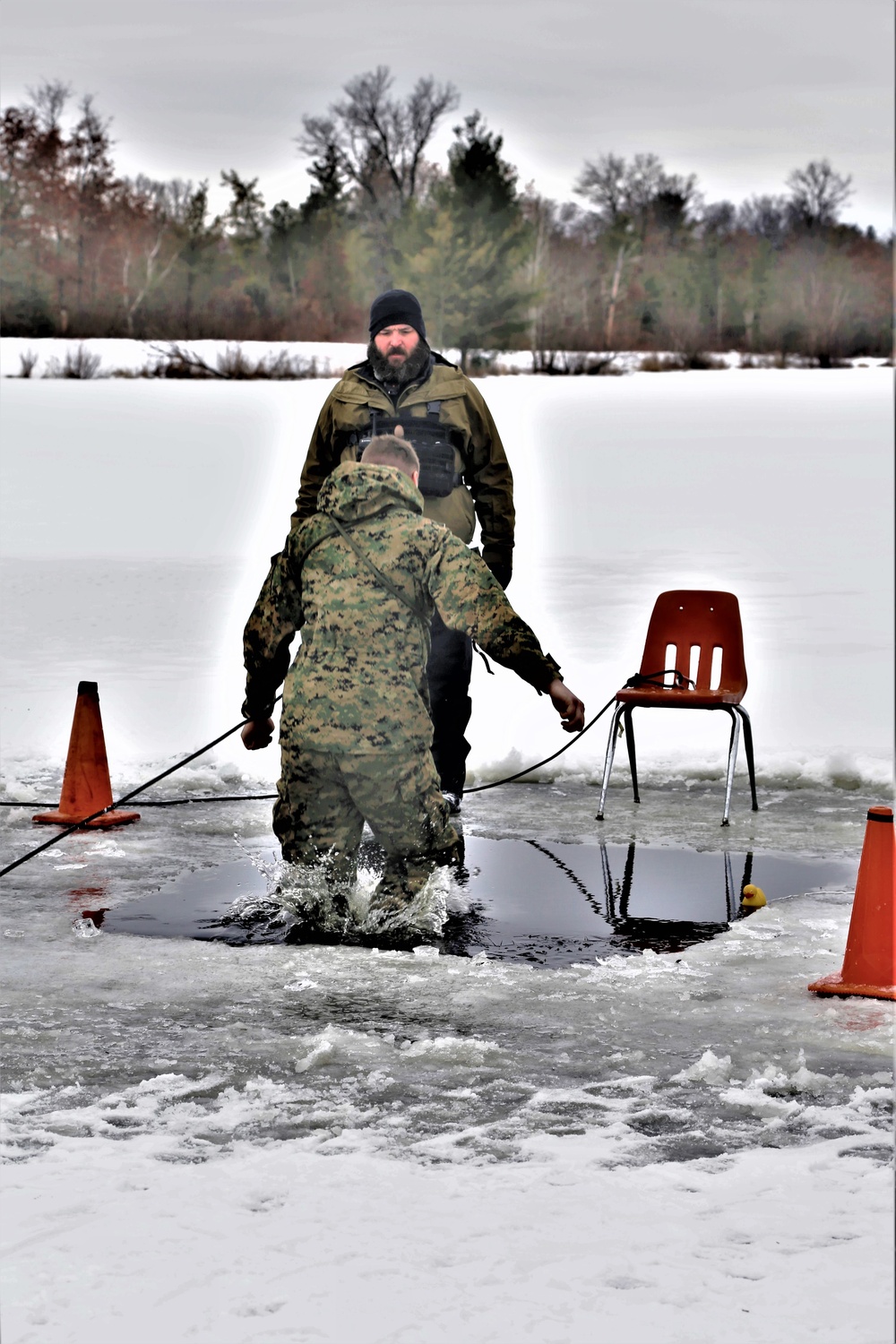 Cold-Weather Operations Course students participate in cold-water immersion training