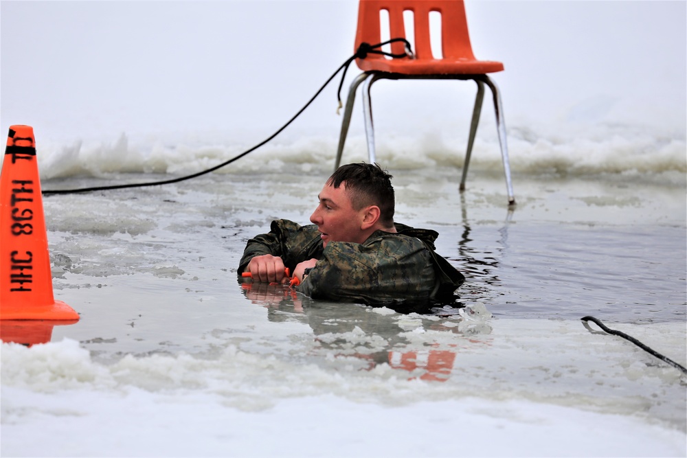 Cold-Weather Operations Course students participate in cold-water immersion training