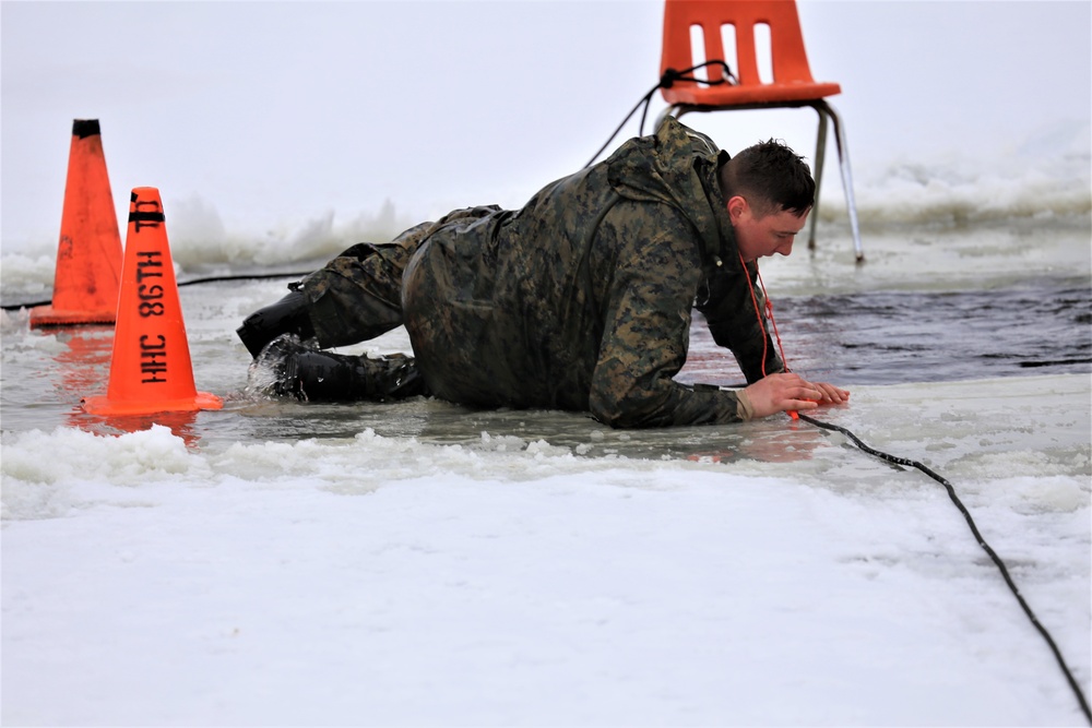 Cold-Weather Operations Course students participate in cold-water immersion training