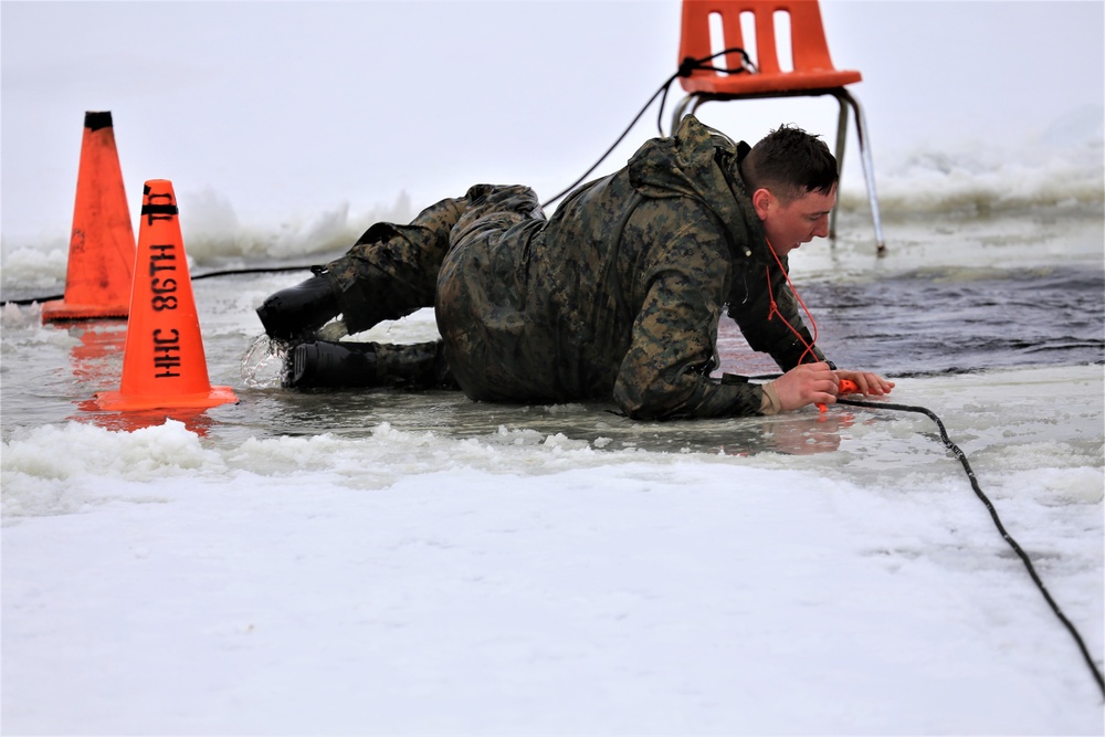 Cold-Weather Operations Course students participate in cold-water immersion training