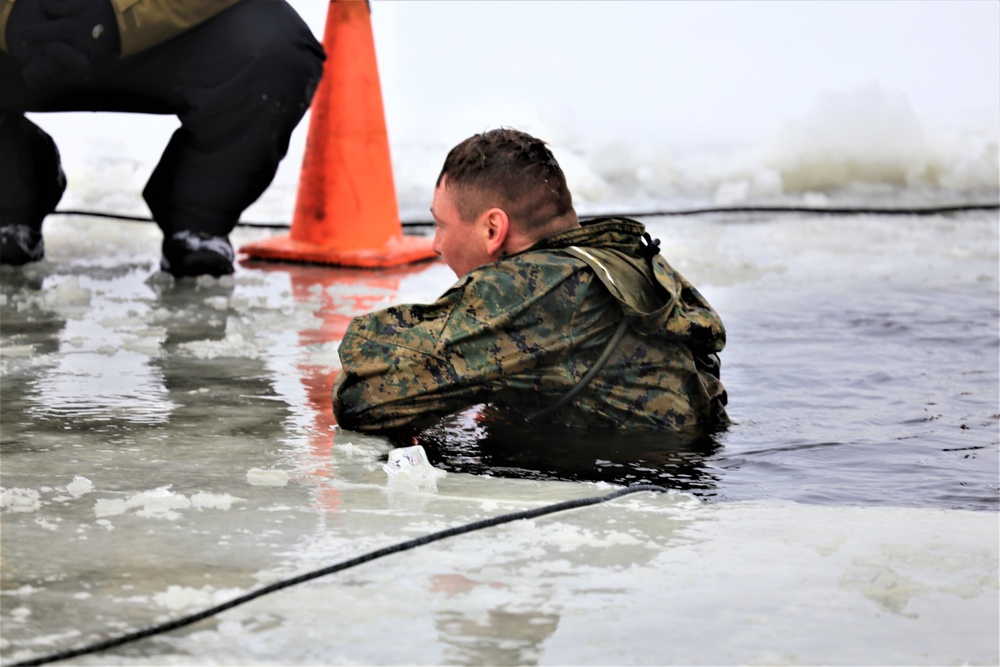 Cold-Weather Operations Course students participate in cold-water immersion training