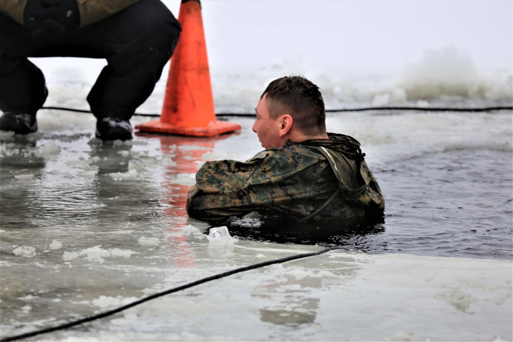 Cold-Weather Operations Course students participate in cold-water immersion training