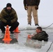 Cold-Weather Operations Course students participate in cold-water immersion training