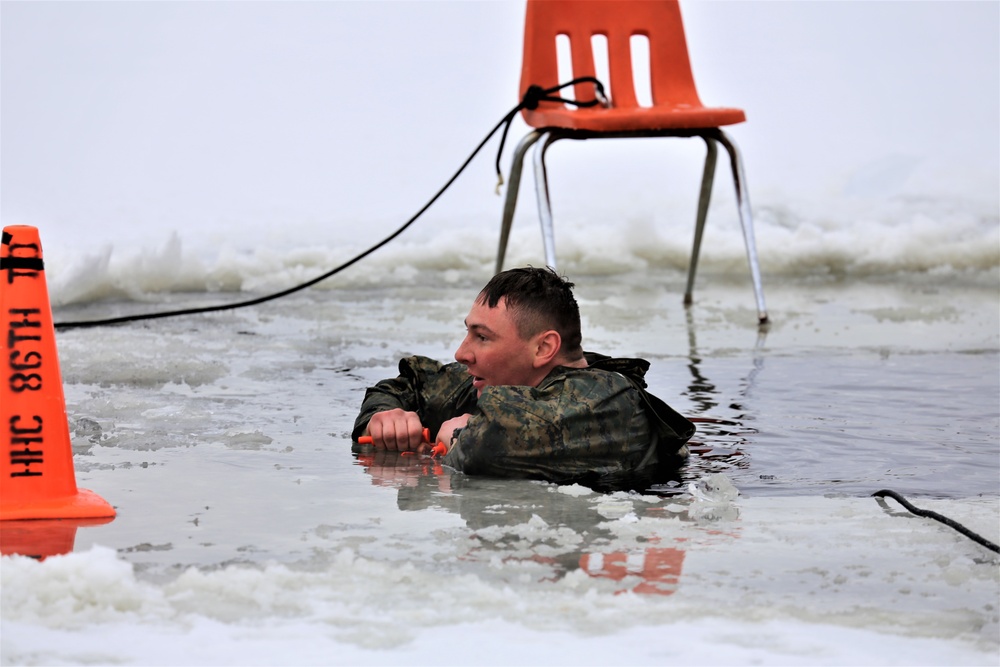 Cold-Weather Operations Course students participate in cold-water immersion training