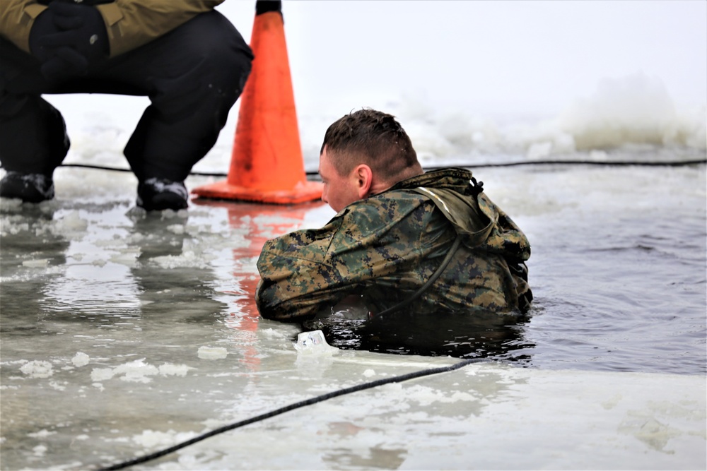 Cold-Weather Operations Course students participate in cold-water immersion training