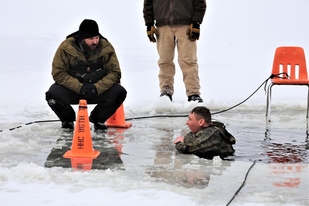 Cold-Weather Operations Course students participate in cold-water immersion training