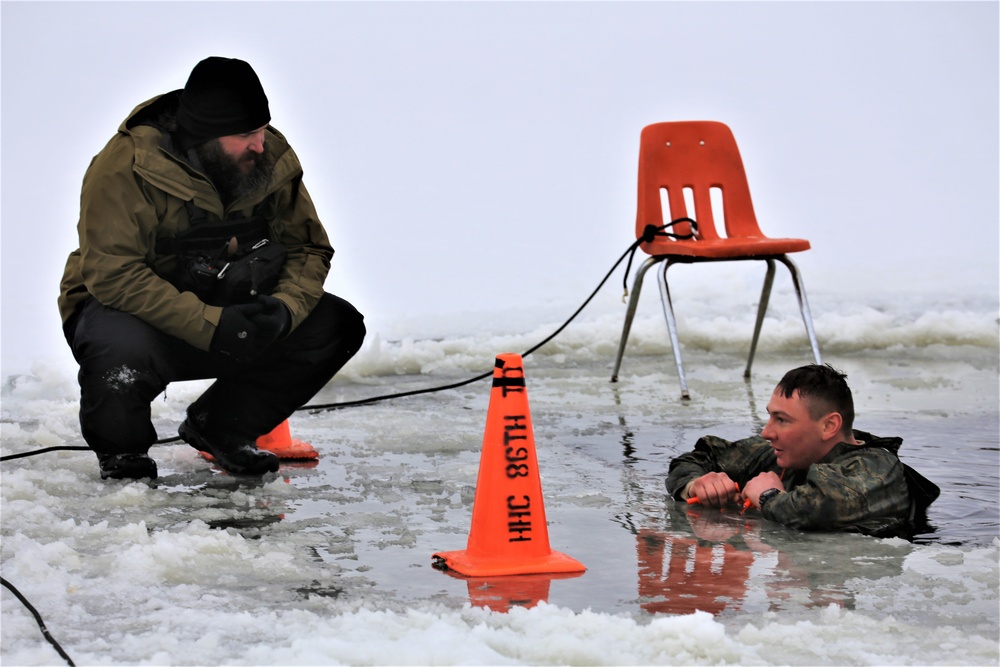 Cold-Weather Operations Course students participate in cold-water immersion training