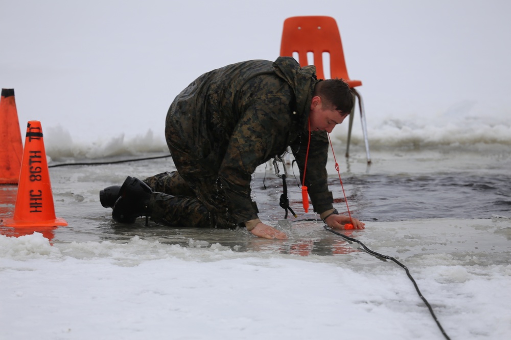 Cold-Weather Operations Course students participate in cold-water immersion training