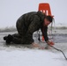 Cold-Weather Operations Course students participate in cold-water immersion training