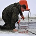 Cold-Weather Operations Course students participate in cold-water immersion training