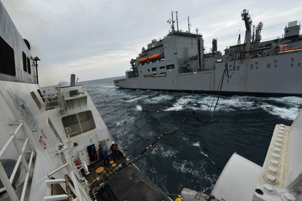 U.S. Coast Guard Cutter Bertholf conducts underway replenishment with the USNS Amelia Earhart in the East China Sea